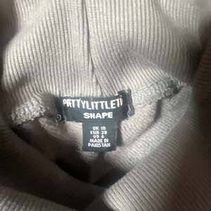 PrettyLittleThing Brown Ribbed Long Sleeve Top